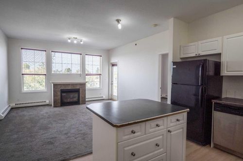 310-1000 Applevillage Crt Se, Calgary, AB, T2A7Z4 | Card Image