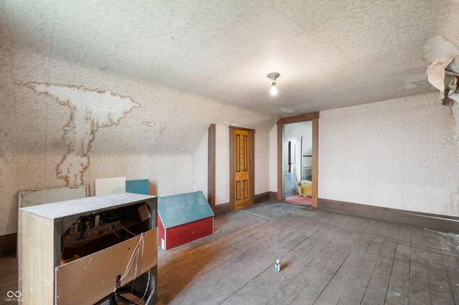 additional living space with wood-type flooring | Image 13