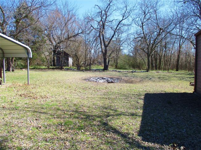 View of yard with a carport | Image 21
