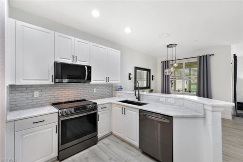 102-1430 Mariposa Cir, NAPLES, FL, 34105-7247 | Card Image