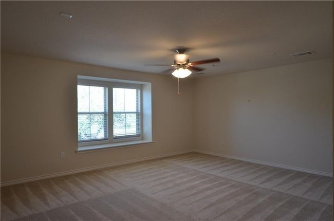 Unfurnished room with carpet flooring and ceiling fan | Image 16