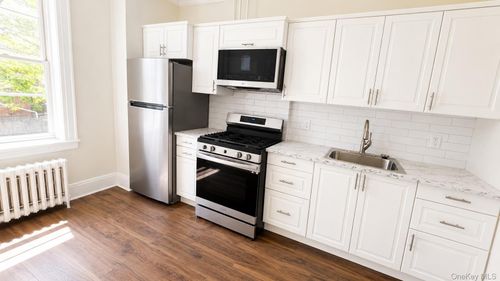 6504 Grand Avenue, New York, NY, 11378 | Card Image