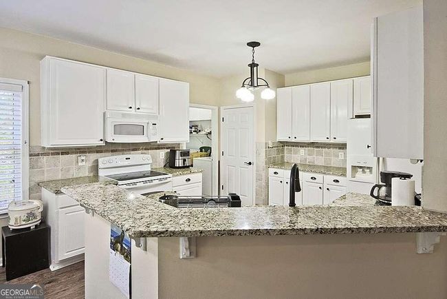 770 Walnut Creek Dr Nw, House other with 5 bedrooms, 4 bathrooms and 4 parking in Lilburn GA | Image 18