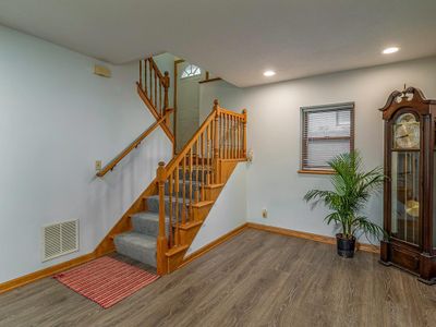 Steps to the upper level bedrooms | Image 3