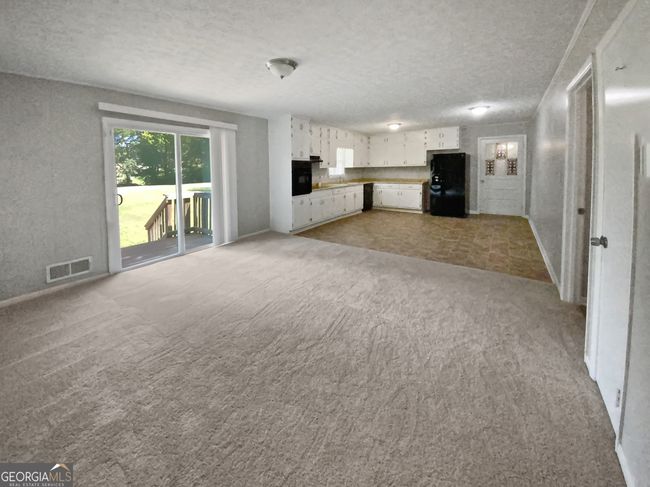 1046 Fox St Se, House other with 3 bedrooms, 2 bathrooms and 2 parking in Conyers GA | Image 4