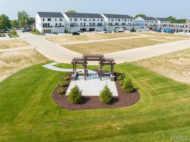 View of community with a pergola, a residential view, and a yard | Image 42