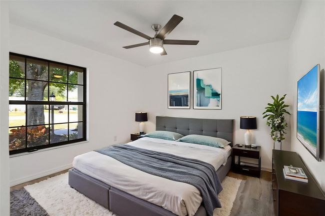 Virtually Staged: Each bedroom features brand-new flooring, fresh paint, and ample natural light. | Image 10