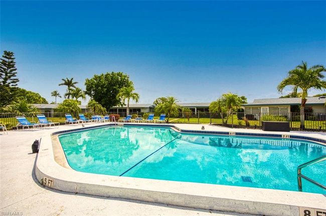 Community pool featuring a patio area | Image 33