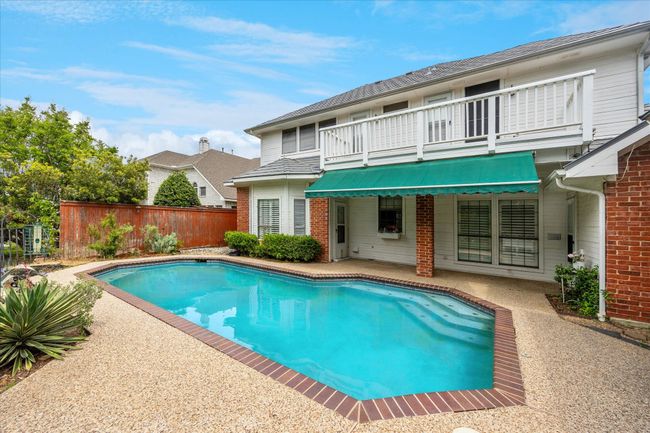 Enjoy the sunset from your balcony or awning covered back patio while sipping a glass of wine. | Image 8