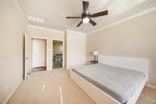 Carpeted bedroom featuring ornamental molding and a ceiling fan | Image 21