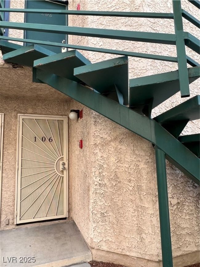 Entrance to property featuring stucco siding | Image 28
