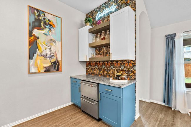 Eye catching custom dry bar with beverage drawer refrigerator. Perfect for entertaining. | Image 11