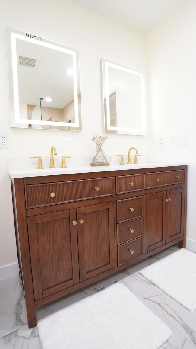 The owners' bath wood double vanity also features ample storage. | Image 14