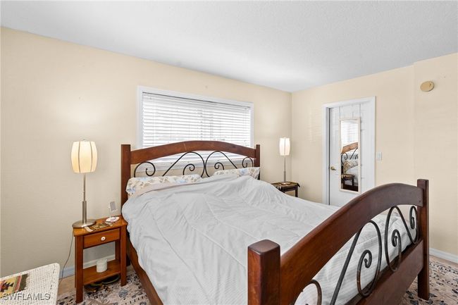 Bedroom with baseboards | Image 17