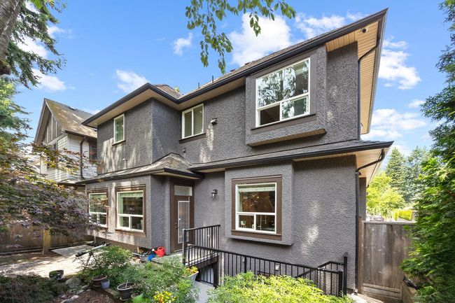 Back of property with stucco siding | Image 30