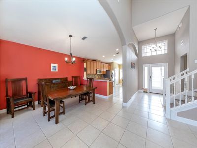 Large transom windows and glass front door makes this house so very bright | Image 3