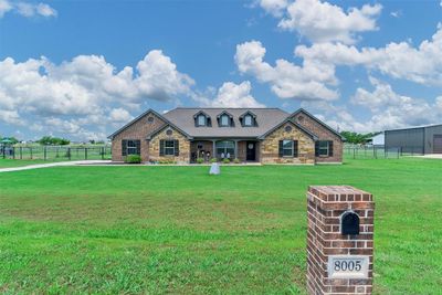 View of front of house with a garage and a front yard | Image 3