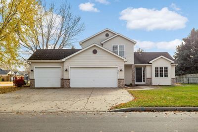 Exterior Front Photo Spacious Concrete Driveway | Image 2