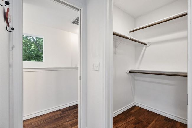 Walk-in closet for the secondary bedroom. | Image 30