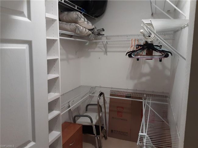 View of walk in closet | Image 15