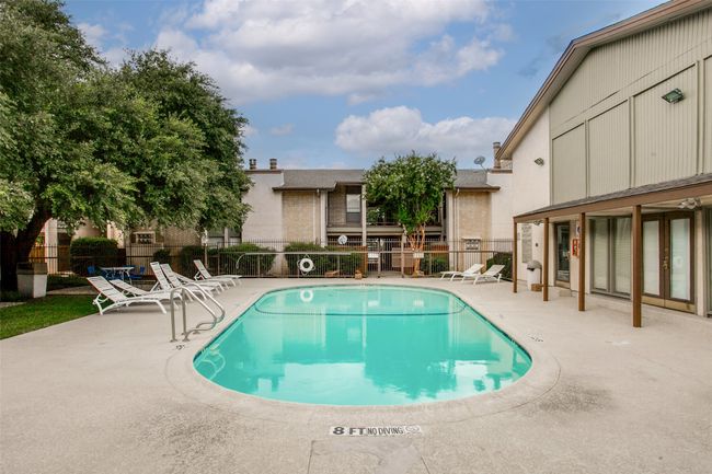 Community pool with a patio area | Image 25