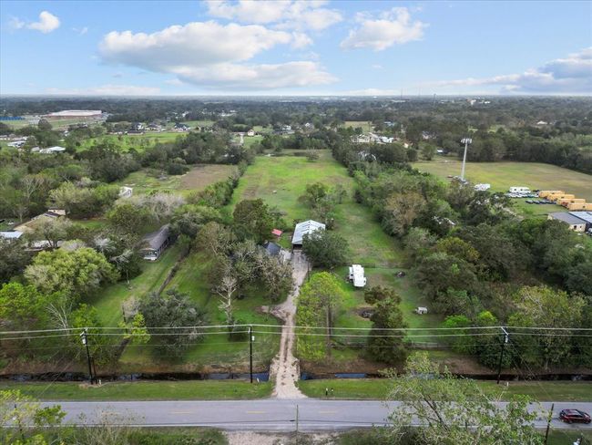 Beautiful mature trees surround the property | Image 6
