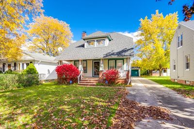 Bungalow-style home featuring a front lawn | Image 2