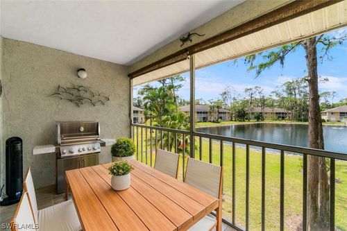 e201-5700 Woodmere Lake Cir, NAPLES, FL, 34112-2707 | Card Image