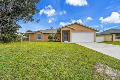 585 Nw Turton Terrace, House other with 3 bedrooms, 2 bathrooms and null parking in Port St. Lucie FL | Image 2