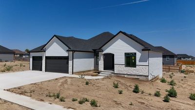 View of front of home featuring a garage | Image 2