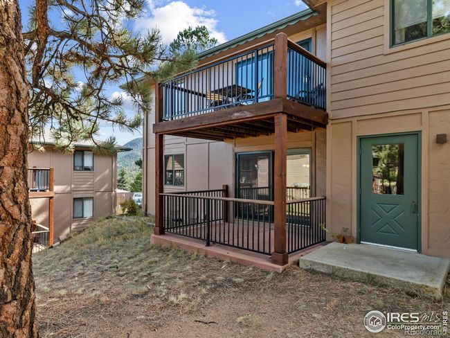 Private patio overlooks open space | Image 6