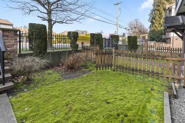 View of fenced backyard | Image 20