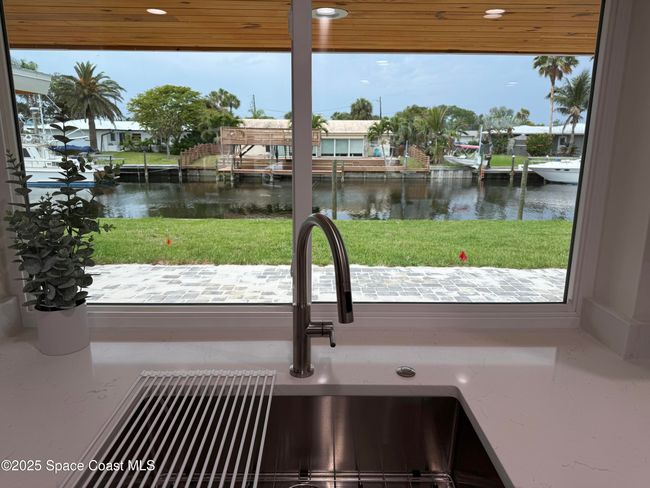 57 Riverview Ln, House other with 3 bedrooms, 2 bathrooms and null parking in Cocoa Beach FL | Image 31