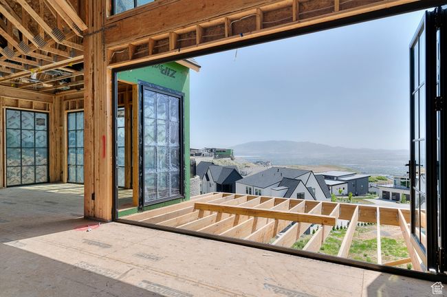 Sunroom / solarium with a mountain view | Image 9