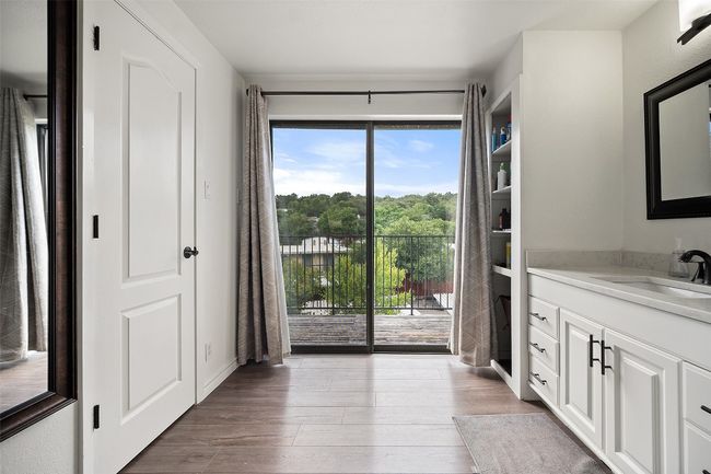 Bathroom with vanity and wood finished floors | Image 11