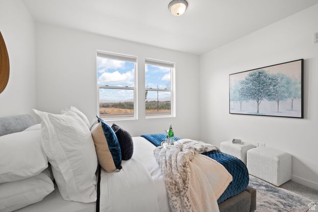 Carpeted bedroom with baseboards | Image 22