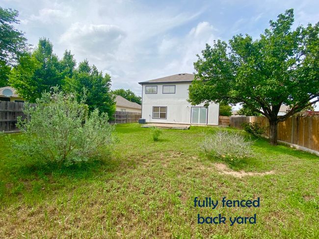 View of yard with a fenced backyard | Image 22