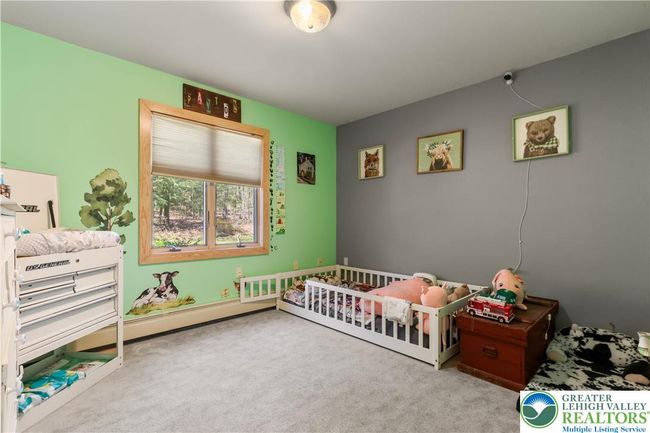 Off of the Foyer is a Bedroom, also could be Office Space / Den | Image 31
