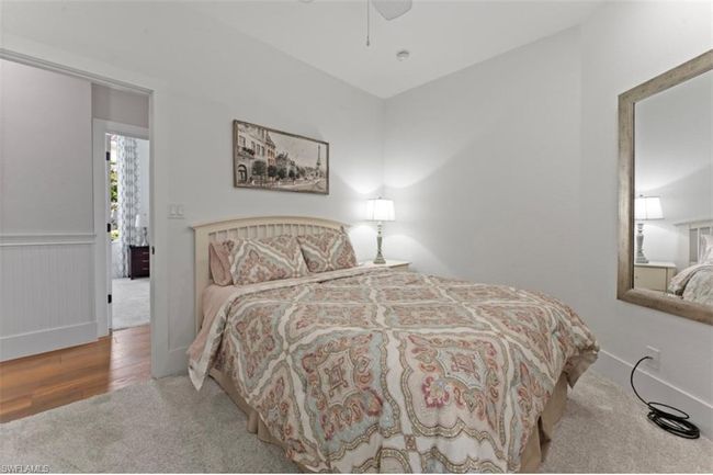 Bedroom featuring carpet floors and a ceiling fan | Image 29