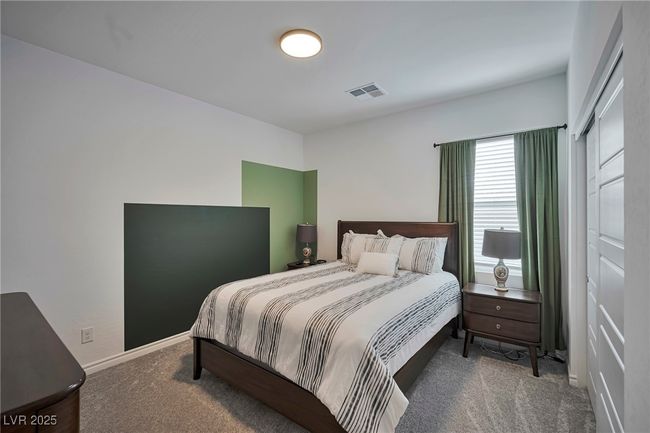 Carpeted bedroom with baseboards and visible vents | Image 25