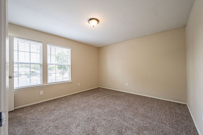 Empty room with carpet floors and baseboards | Image 26