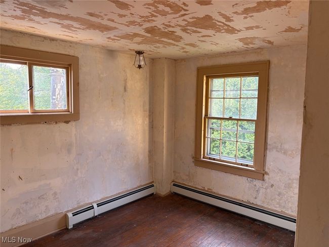 Bedroom 4 with access to the back stairs to the kitchen | Image 26