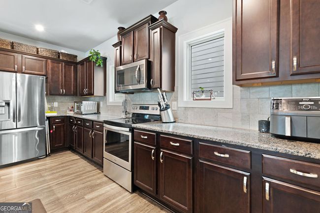 3255 Morgan Rd, House other with 5 bedrooms, 4 bathrooms and 2 parking in Buford GA | Image 18