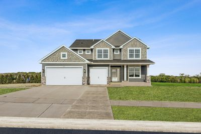 Photo is of the actual model. Exquisite compliments of shakes, stone, and siding in a fantastic Delano neighborhood. | Image 1