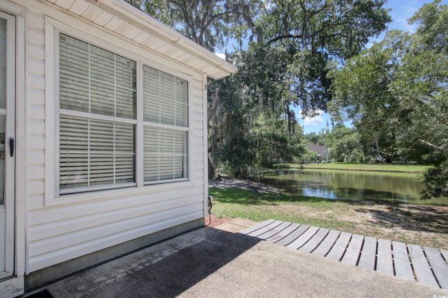 View of patio / terrace featuring a water view | Image 28
