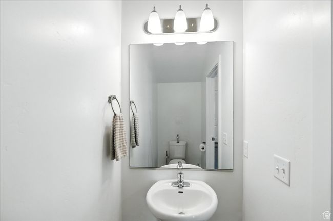 Bathroom featuring a sink | Image 7