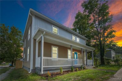 View of front of property with covered porch | Image 1