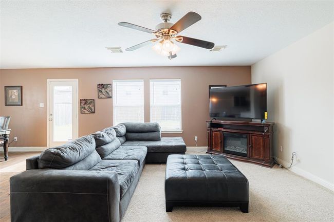 Another view of the spacious family room. | Image 12