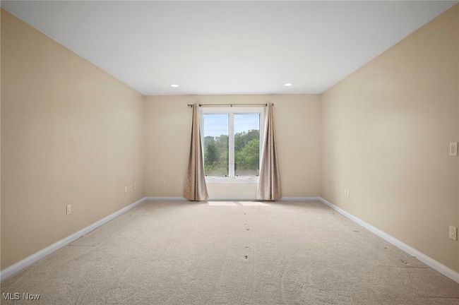 Carpeted bedroom with recessed lighting | Image 26