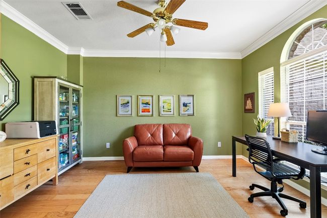 The dedicated office, with french doors, offers a quiet retreat perfect for focused work or creative projects | Image 7